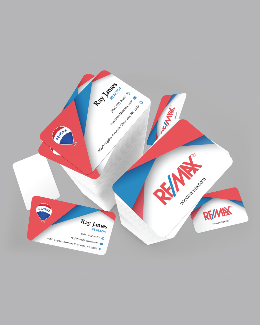 Remax Red and Blue Abstract Business Cards