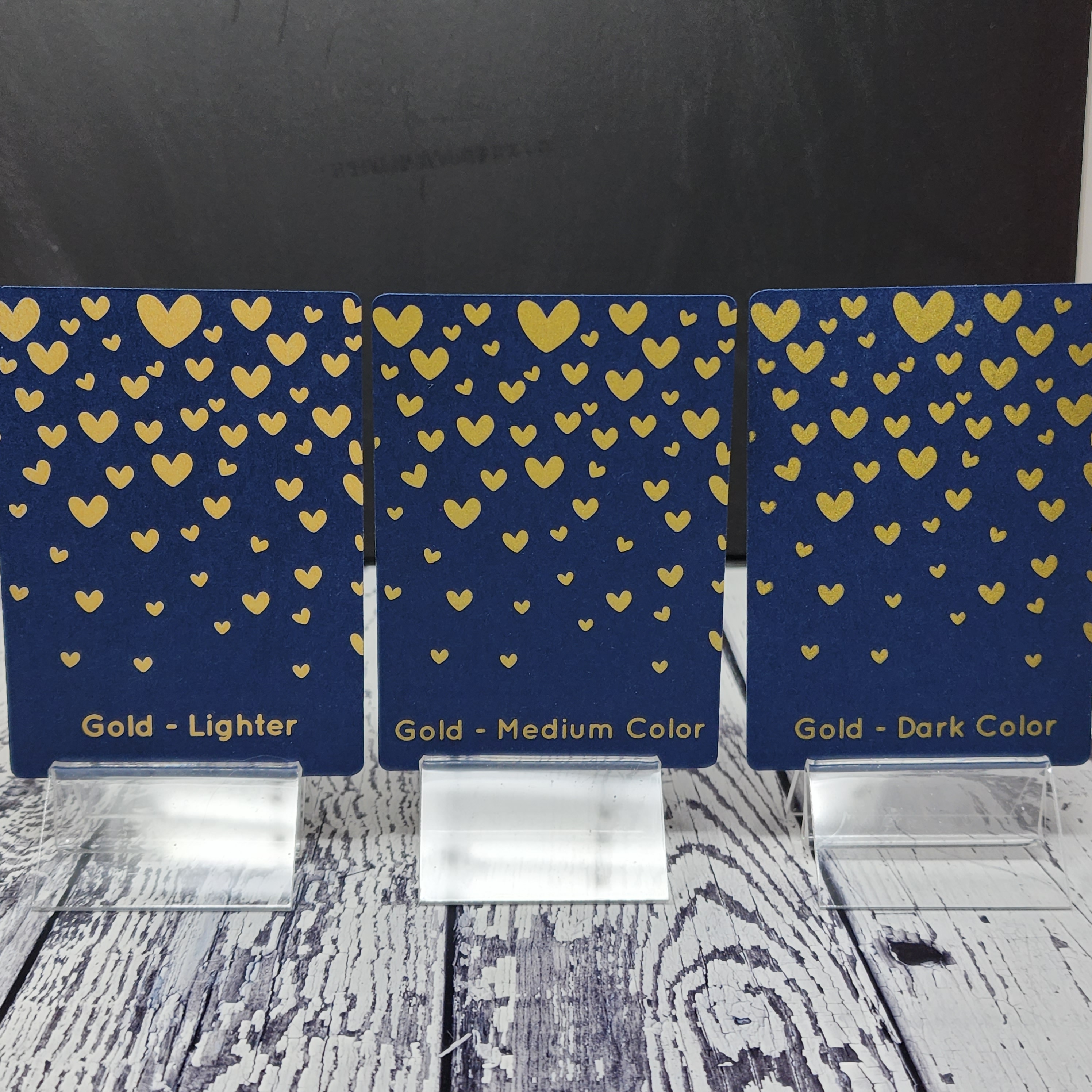 Gold ink on dark blue cards