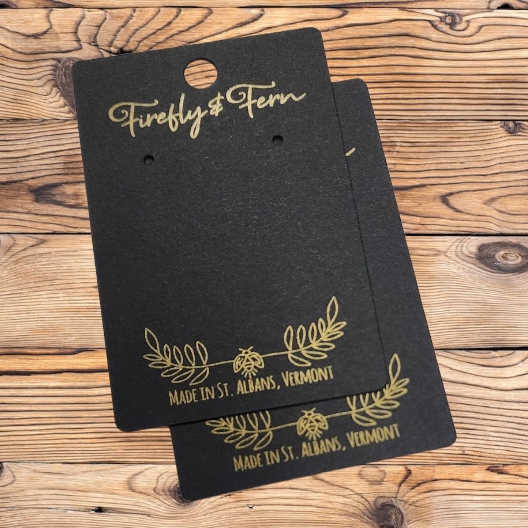 Gold ink printing on black jewelry cards